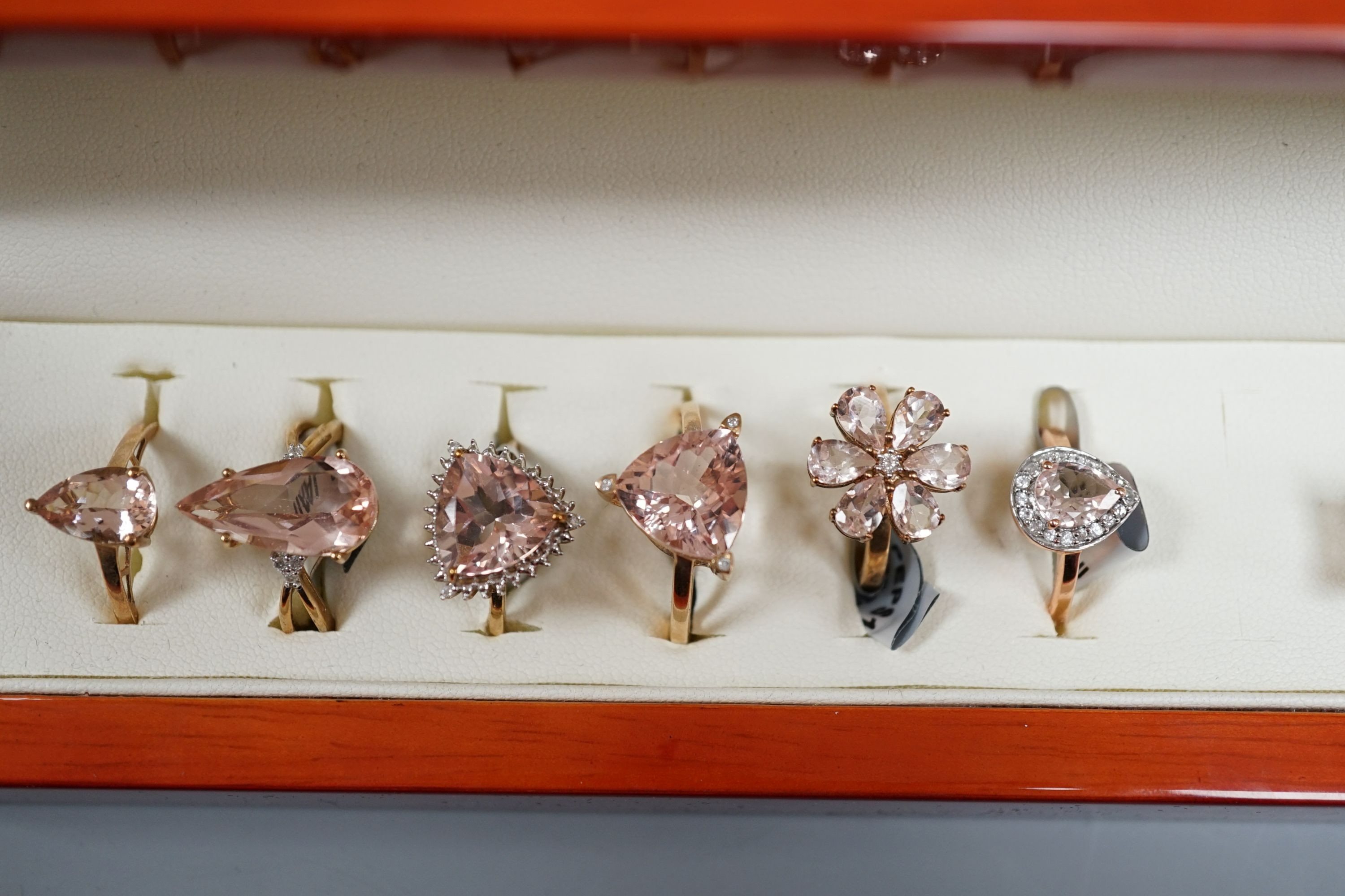 Eight assorted modern 9ct gold and morganite set dress rings and a 925 and gem set ring